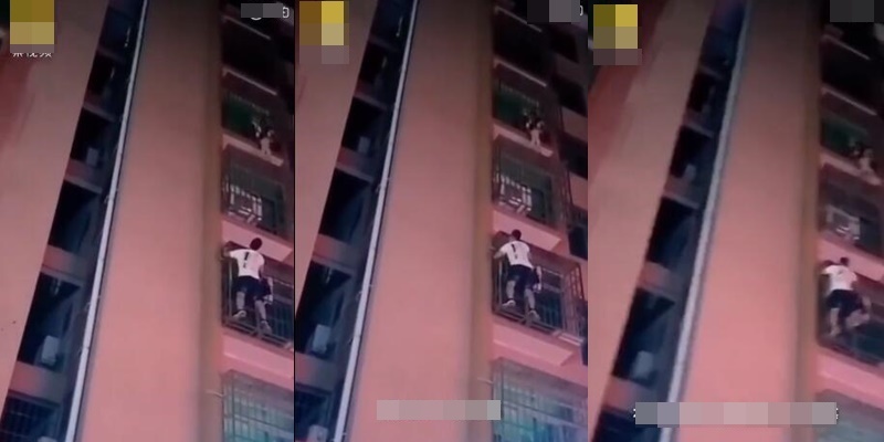 The man hanging in midair on the 6th floor