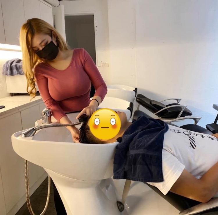 A hair-washing girl causing a stir online