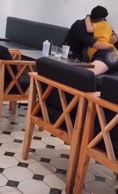 Couple Caught Getting Intimate in Cafe Sparks Outrage 2 Image that sparked outrage online.
