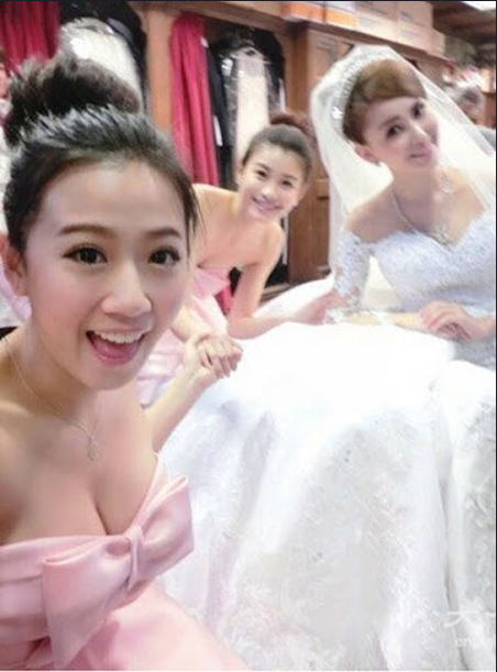 Viewers feel this bridesmaid is squeezing her chest too much, making it look like it might burst out.