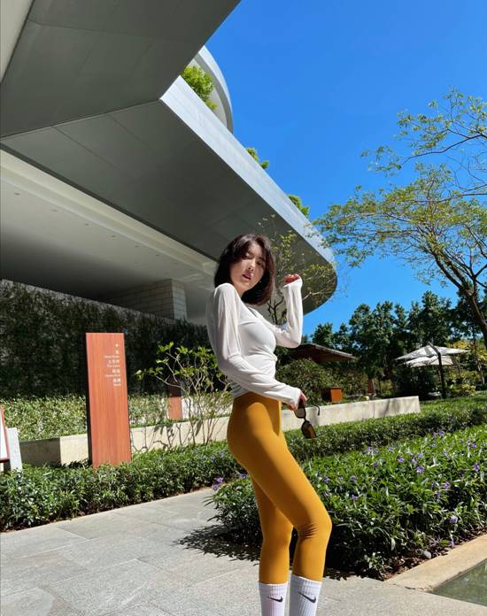 Nie Xiaoyu posing in retro style outfit