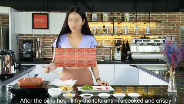 Although it's a cooking tutorial, this girl’s outfit is extremely provocative