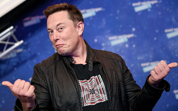 Elon Musk speaking at a conference
