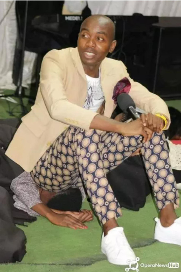 Pastor Chris Penelope blessing by sitting on faces