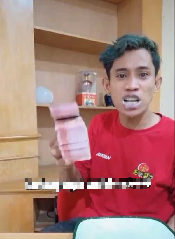 Showing off the money after finishing the challenge