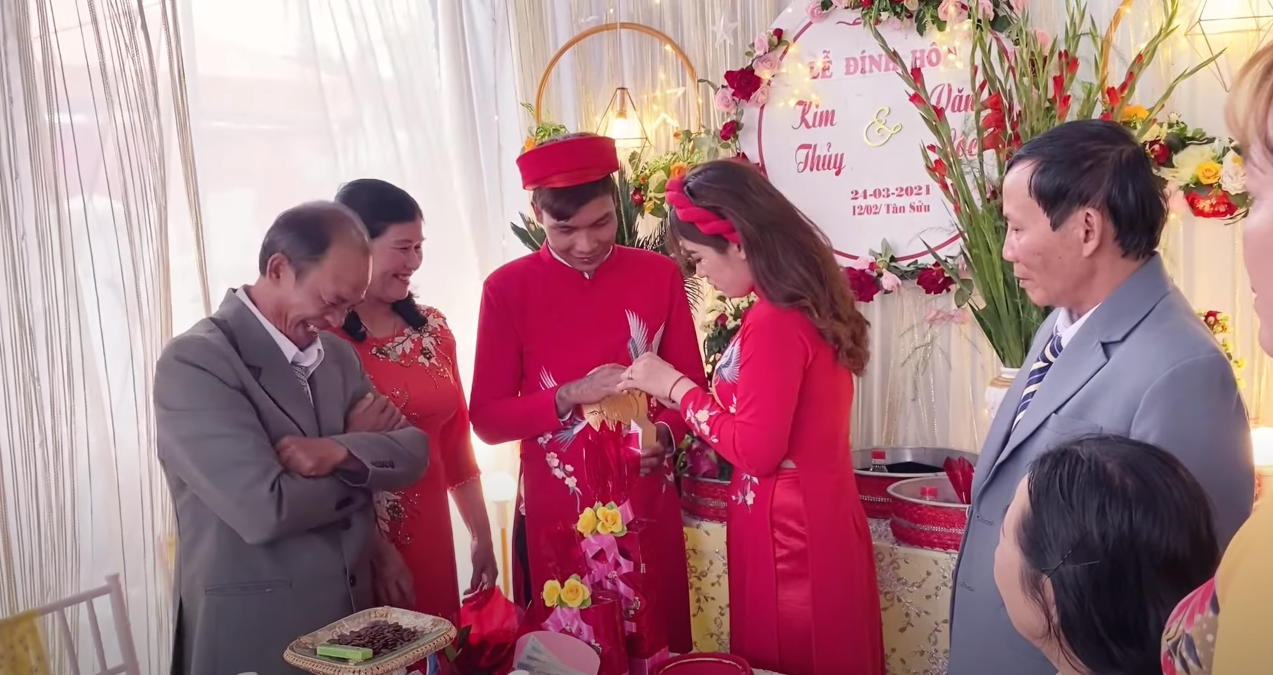 Parents from both sides witnessing the ring exchange