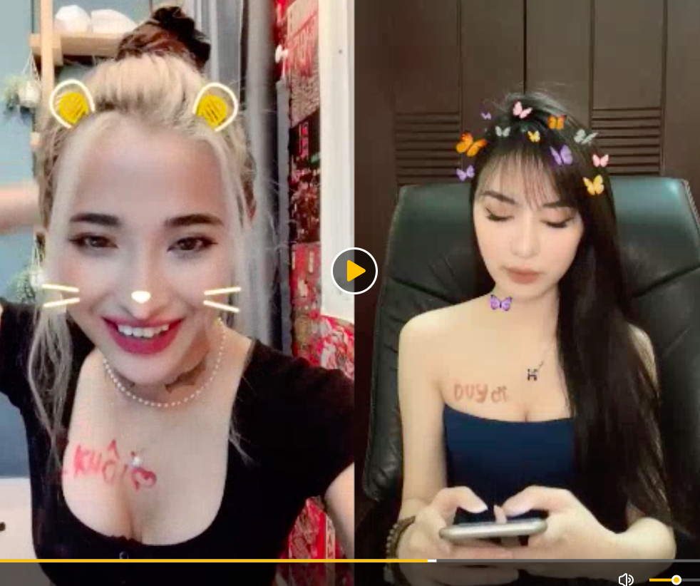 Jessie Nguyen smiling after writing fan name on chest