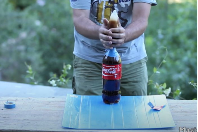 YouTuber Tests Mentos and Coke Reaction Inside a Condom 2 All the materials ready, he starts his reckless experiment