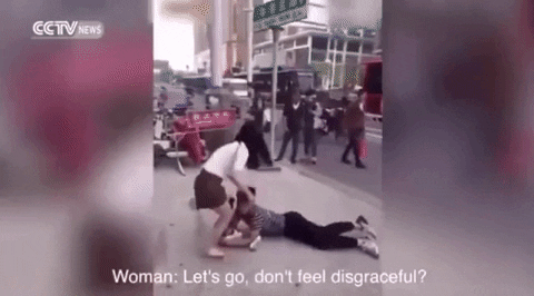 Guy Clings to Girlfriend’s Legs, Pulls Off Her Socks in Public Breakup 5 The video is causing a huge online buzz