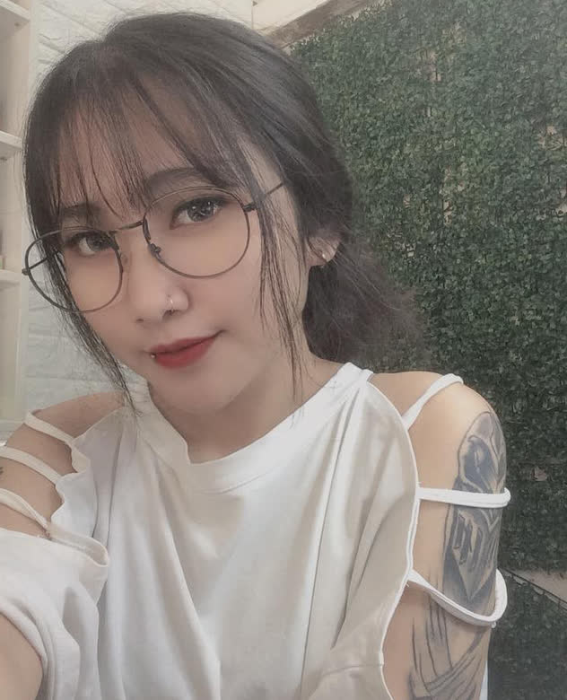 My Tun showing her tattoos