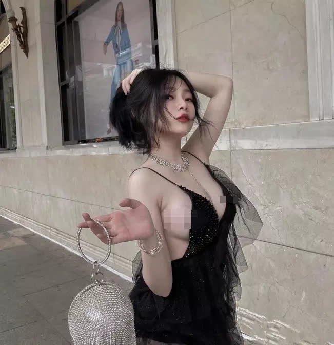 Linh Chichan in revealing outfit