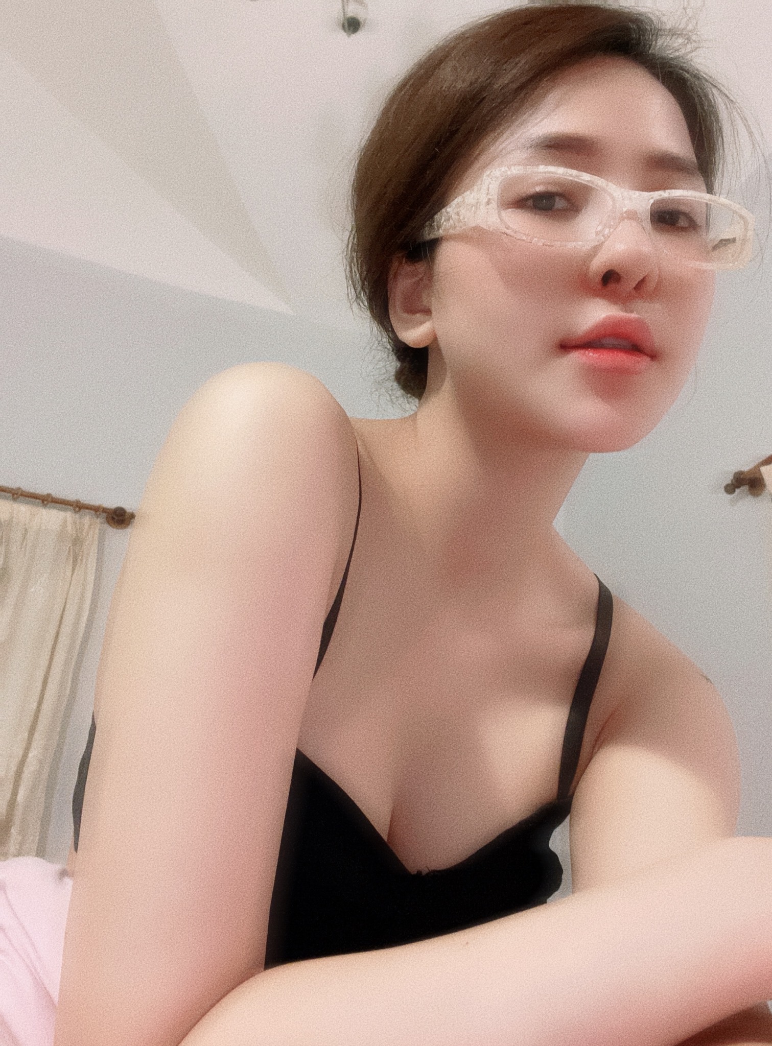 Trâm Anh posing in a casual outfit