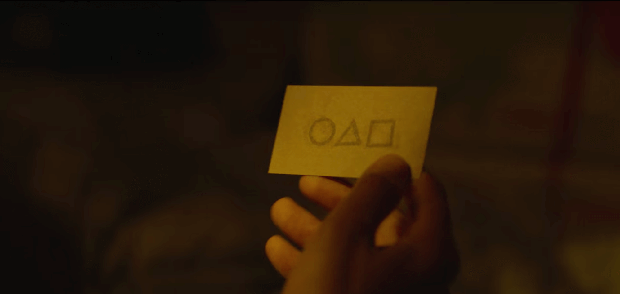 Circle, triangle, square symbols on business card