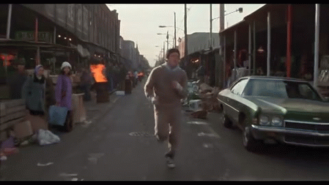 Sylvester Stallone catches an orange in Rocky
