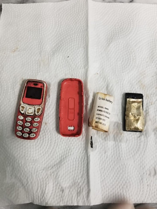 The phone was cut into three parts