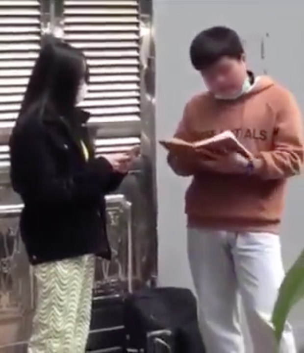 Guy Demands Ex Repay Bread to Motel Bills in Viral Breakup Clip 1 Guy holding notebook to calculate debts with ex