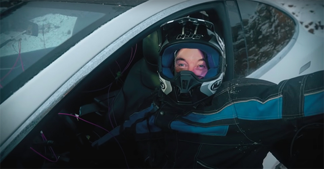 YouTuber Blows Up Tesla After $20K Battery Repair Bill 4 Elon Musk doll placed inside the car