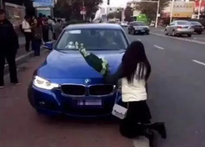 She almost lost all dignity and refused to stand up in the middle of the street