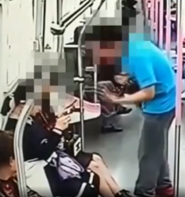 Guy Slaps Hot Girl on Subway After She Rejects His Number Request 1 Guy approaching a beautiful girl to ask for her number