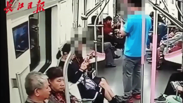 Guy Slaps Hot Girl on Subway After She Rejects His Number Request 3 Full video clip showing the guy's controversial action