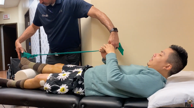Khoa Pug undergoing physical therapy