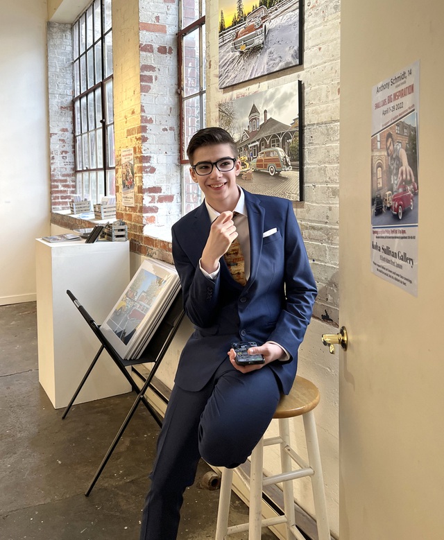 14-Year-Old Autistic Photographer Wows with Toy Car Shots 2 Anthony at one of his photo exhibitions - Photo: anthonyryanschmidt.com