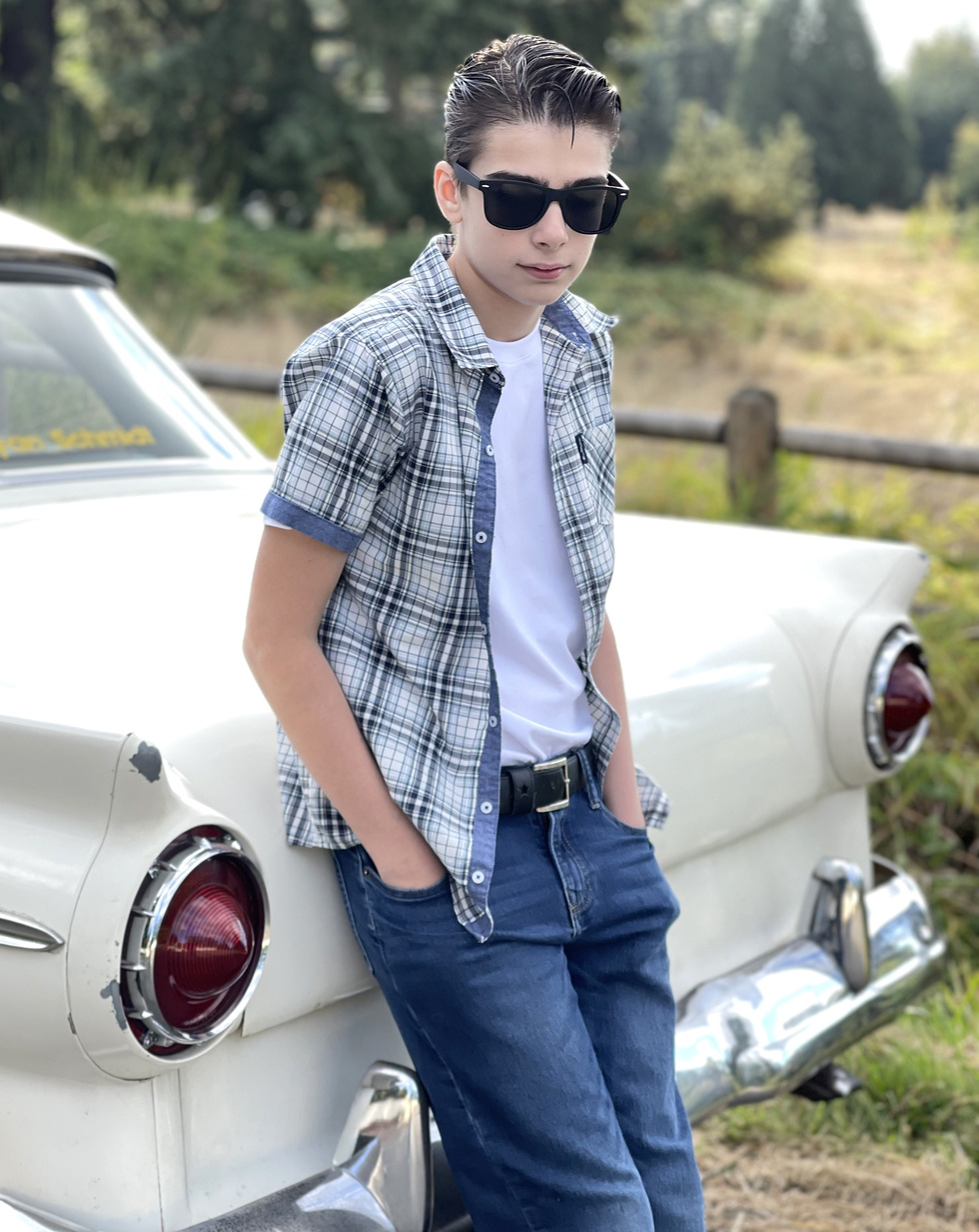 14-Year-Old Autistic Photographer Wows with Toy Car Shots 6 Anthony next to the car gifted by a fan. When he asked why, the fan said: 'I don’t know, I just felt you should have this car' - Photo: anthonyryanschmidt.com