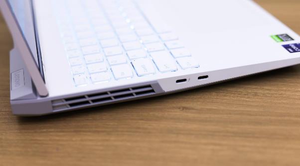 Left side with two USB Type-C ports, one supports charging with low wattage adapter