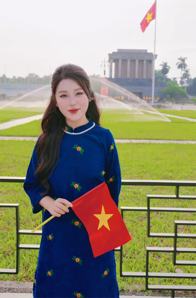 Tran Thanh Nga in festive ao dai