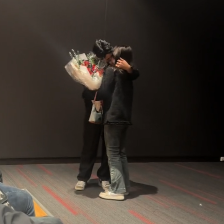 Couple kissing after proposal