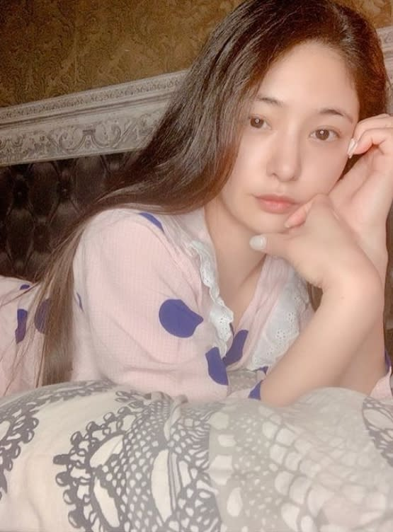 Megumi posing for a photo