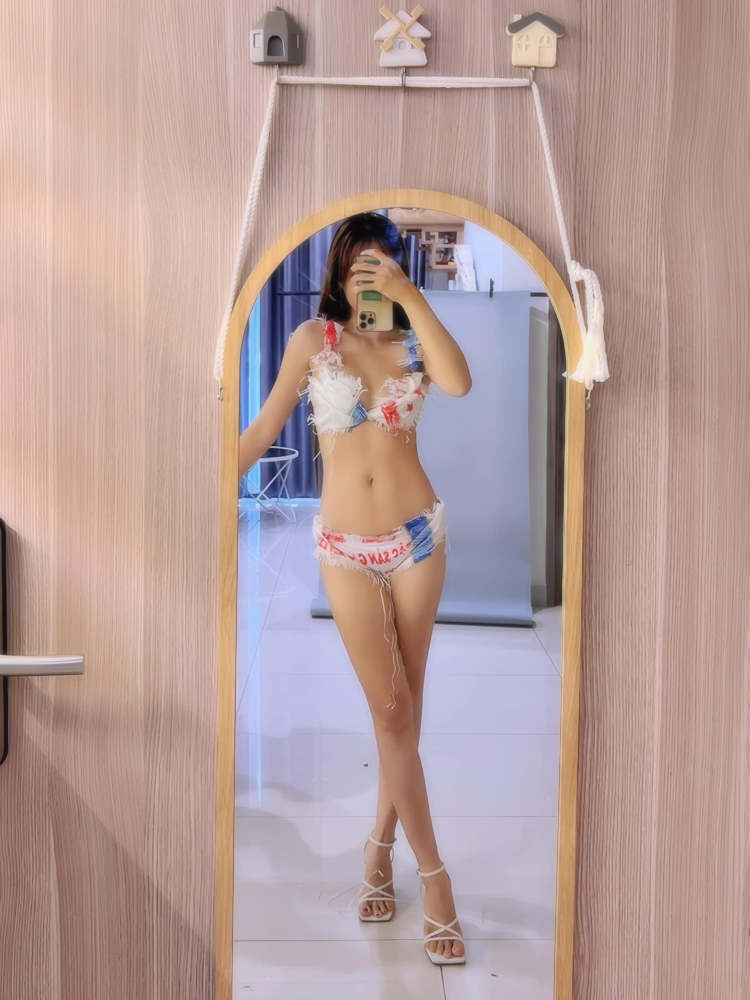 Mai Linh Zuto in ripped bikini
