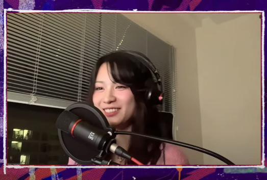 Meet Hekki, The Stunning Singer Taking MixiGaming by Storm 2 Hekki singing passionately