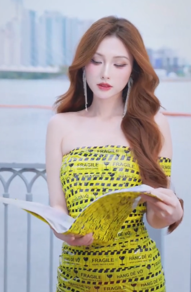 Thanh Mèo Goes Viral in Tight Tape Dress, Reveals Shy Side 4 Close-up of Thanh Mèo's tape dress