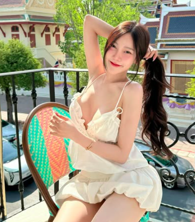 Thai Hot Girl Stuns Fans with Bold Tape Dress Trend 3 Close-up of Natpaphat Ounboontan's tape dress