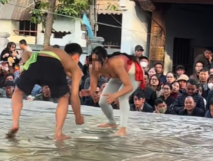 Female Wrestler Stuns Fans Wearing Tight Gym Gear in Match 7 Action shot from match