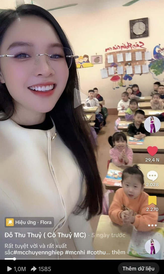 Teacher Thuy with students