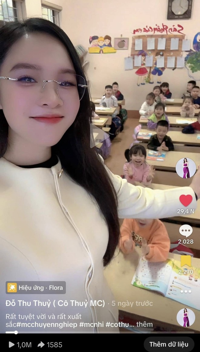 Teacher Thuy smiling in class