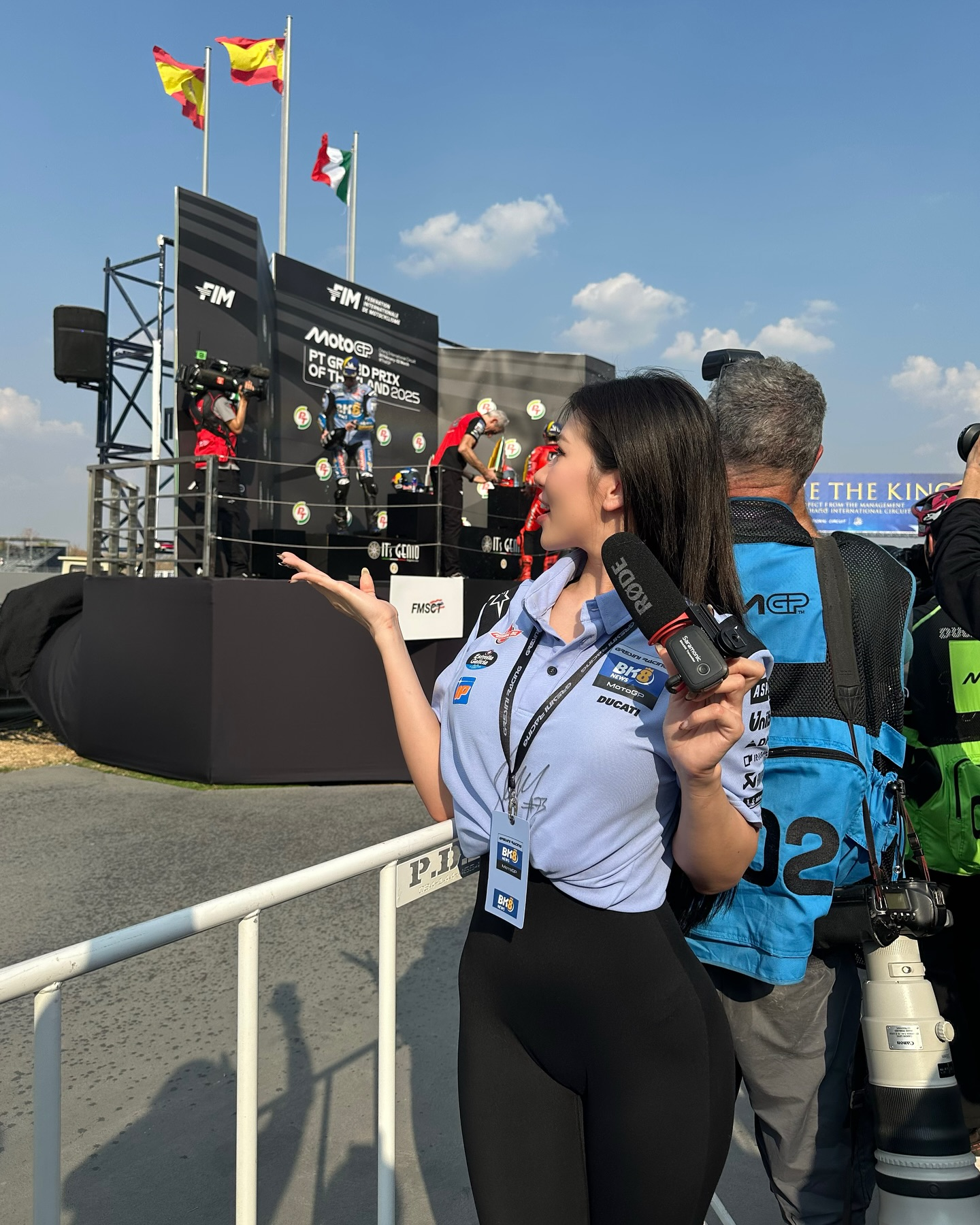 Ms Puiyi Turns Heads with Stunning Curves at MotoGP Race 1 Ms Puiyi at MotoGP event