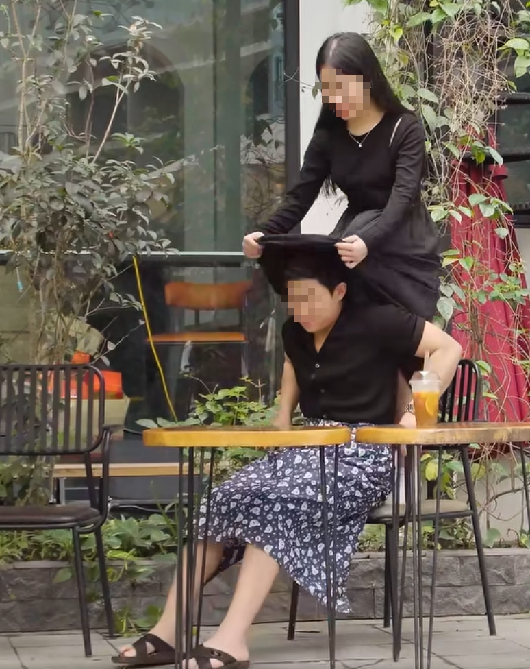 Guy Hides Under Friend’s Dress in Viral Video Sparking Backlash 1 edit screenshot 2025 05 09 094057 17467666910341643902612 1746776539640 1746776539850898321061