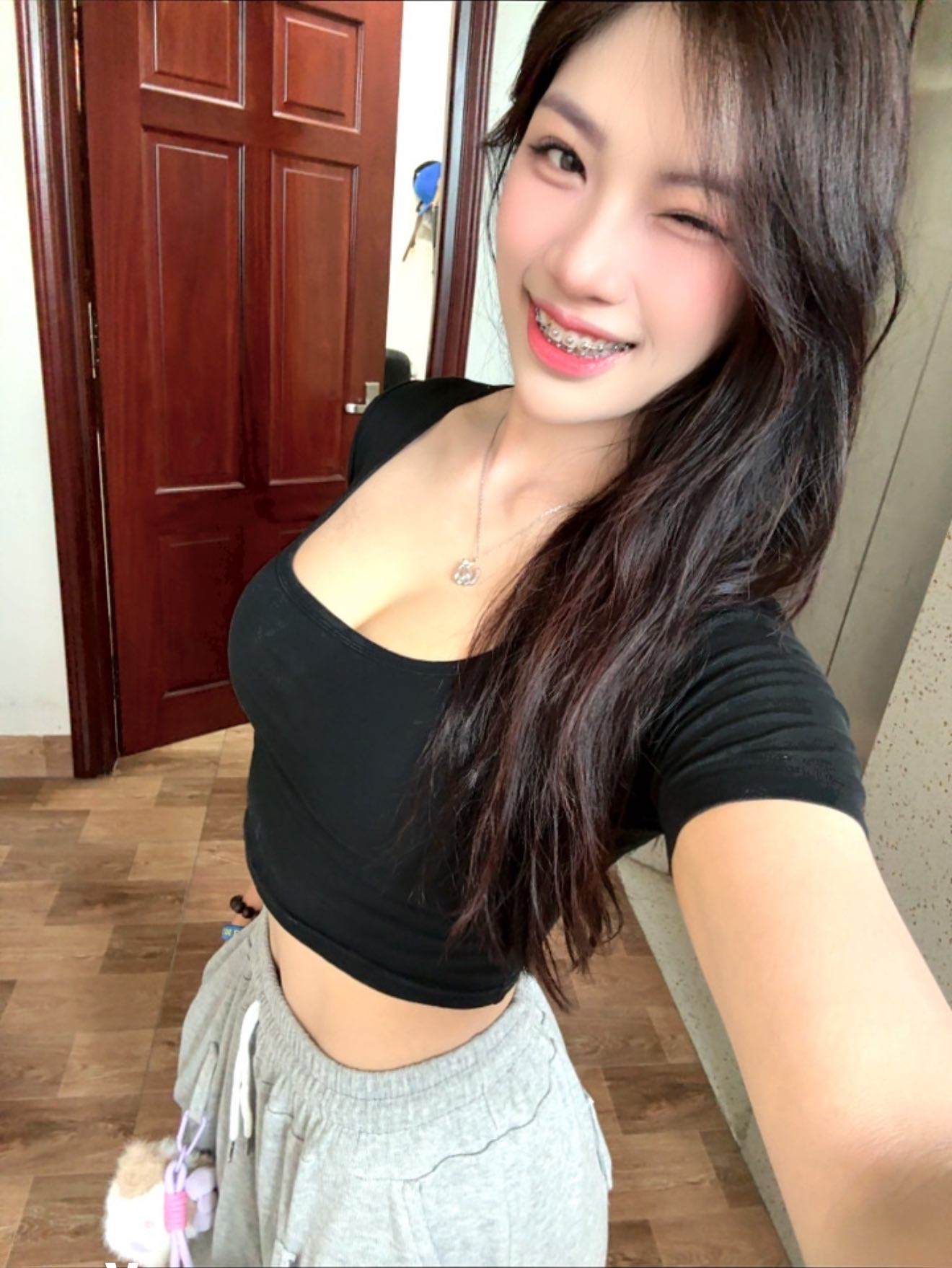 Wrestler Anh Tho Stuns Fans with Bikini Look 3 Anh Tho smiling with braces