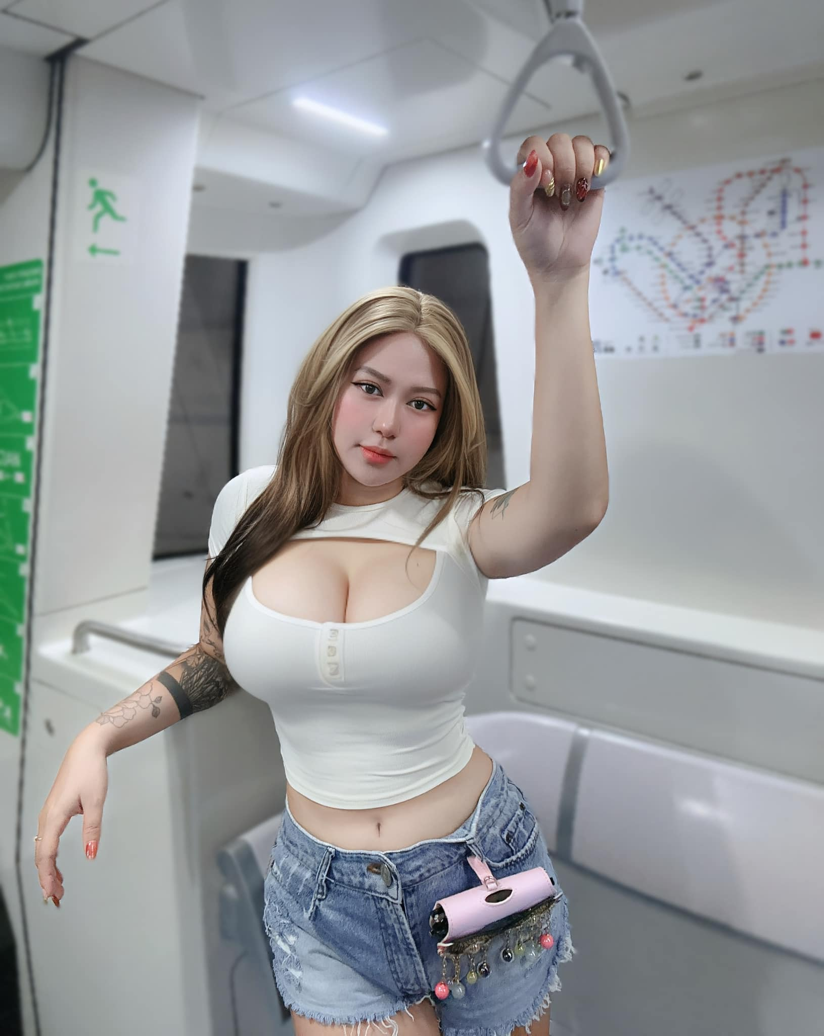 Suzie Nguyễn posing confidently in a bold outfit
