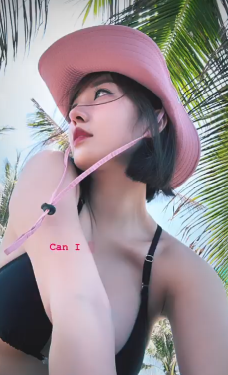 Banker and TikTok Star Hà Kim Stuns in New Bikini Photos 1 Hà Kim posing in sporty outfit