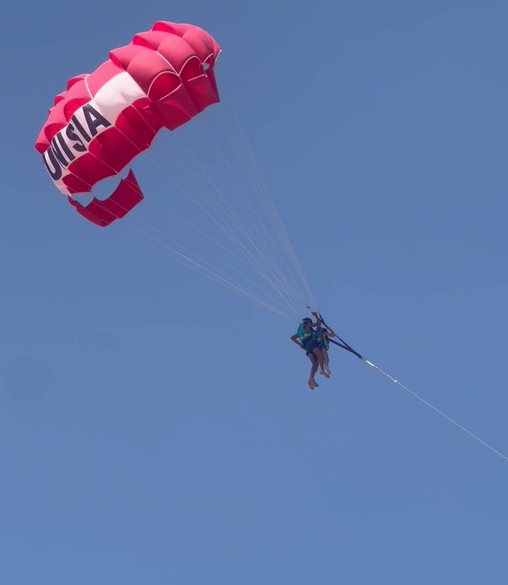 52-Year-Old Woman Sexually Assaulted During Paragliding Flight 1 Michelle on a paragliding flight with a young Tunisian instructor
