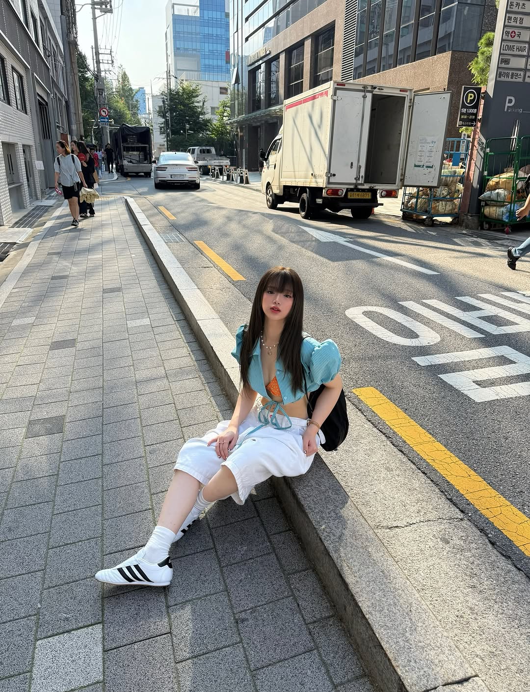 Linh Ka posing in trendy outfit