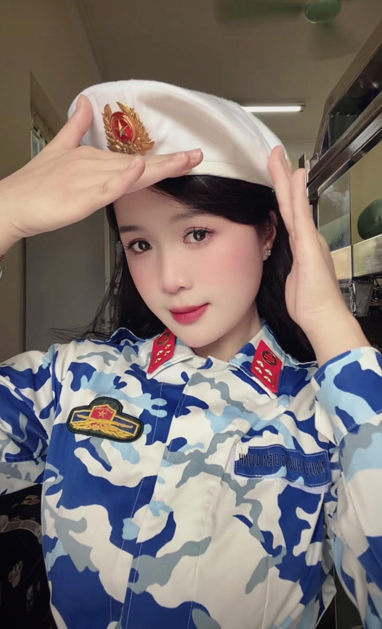 Quỳnh Nguyễn in military medic uniform