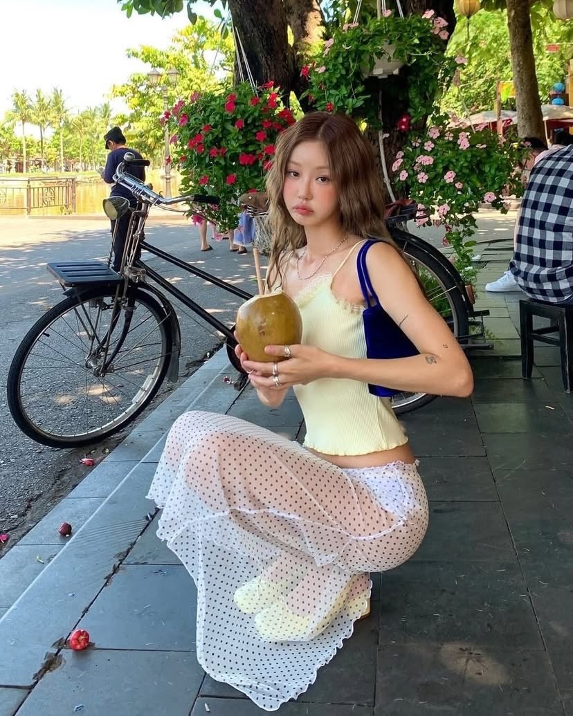 Controversial See-Through Outfit Sparks Debate in Hoi An 3 Woman wearing transparent skirt revealing underwear