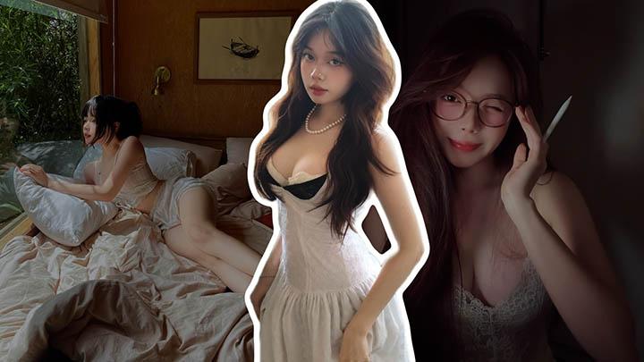 Nguyễn Quỳnh Anh posing elegantly in a white dress