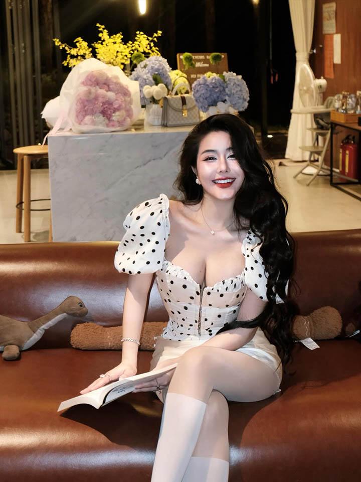 Ngoc Tran Stuns Fans with Summer Bikini Photos 10 Ngoc Tran in white polka dot bikini top and striped pants