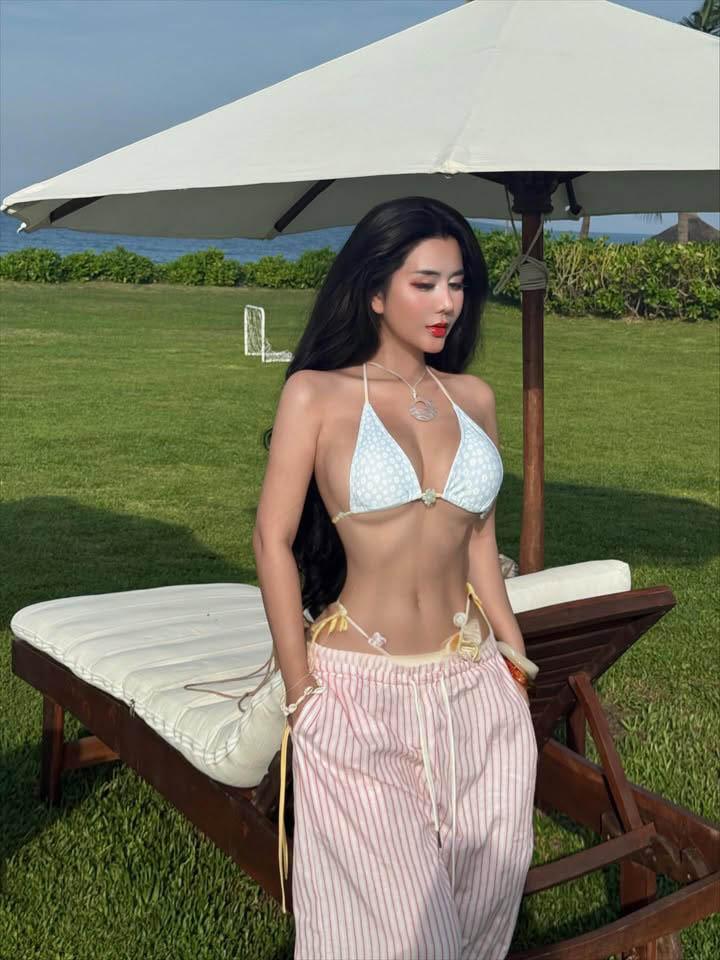 Ngoc Tran Stuns Fans with Summer Bikini Photos 11 Ngoc Tran posing confidently outdoors